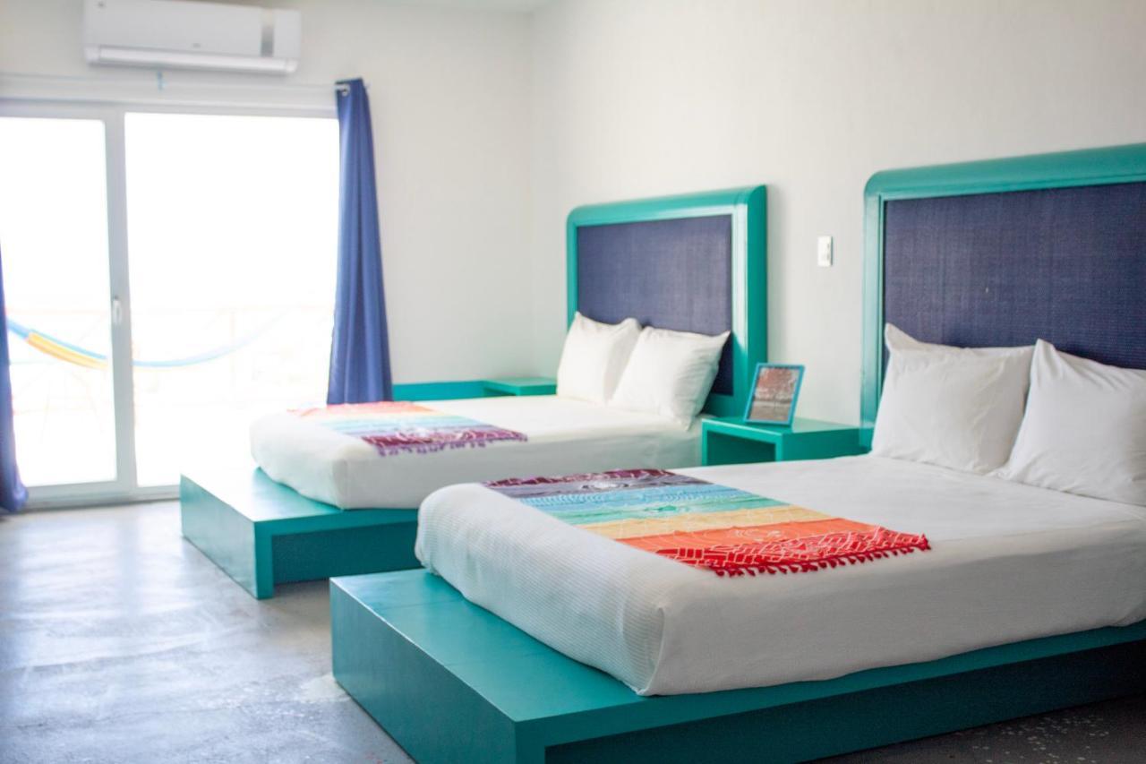 Esduma La Perla Hotel إيسلا موخيريس المظهر الخارجي الصورة